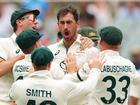 Mitchell Starc celebrates his wicket off the first ball of the Test.