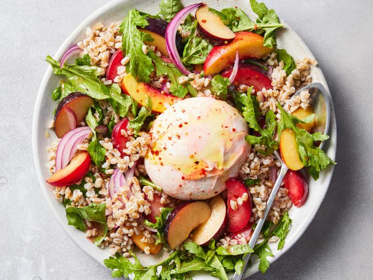 Herby farro salad with stone fruit and burrata. Any jumble of stone fruit, including those that have gone past ripe, are a fit for this farro salad. Food styled by Rebecca Jurkevich. (Christopher Testani/The New York Times)