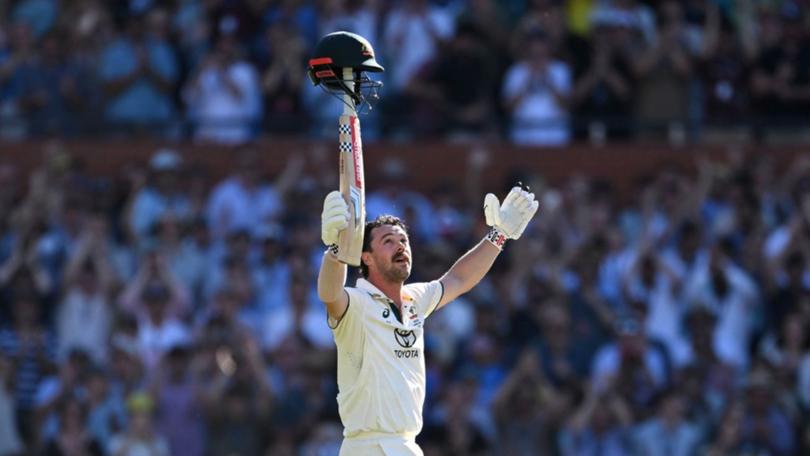 Head celebrates his century at Adelaide Oval.