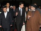 In Bashar al-Assad’s (C) fall, Tehran hasn’t only lost a client; it has seen its ability to project power, key to its own security, upended. (Former Iran President Mahmoud Ahmadinejad R)