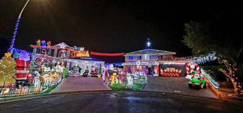 At 57 Swansona Avenue, Mount Annan, the Christmas lights are winding and colourful, making them great to take photos with.