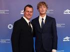 At 15 Cruz Hewitt already towers over father Lleyton as they pose at the Newcombe Medal night. (Morgan Hancock/AAP PHOTOS)