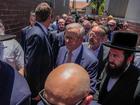 MELBOURNE, AUSTRALIA - DECEMBER 10: Australian Prime Minister Anthony Albanese arrives to see the damaged Adass Israel Synagogue on December 10, 2024 in Melbourne, Australia. An arson attack on the Adass Israel Synagogue in Melbourne last week forced congregants to flee as flames engulfed the building early on Friday morning. Prime Minister Anthony Albanese condemned the incident as an antisemitic act, emphasizing that such violence at a place of worship is unacceptable in Australia and labelling the event an act of terrorism. (Photo by Asanka Ratnayake/Getty Images) Asanka Ratnayake