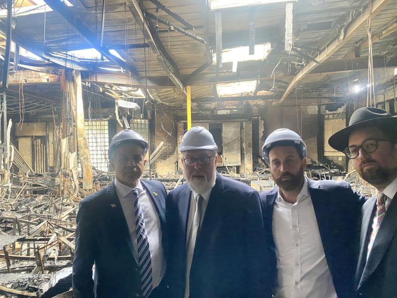 Israel’s Ambassador to Australia Amir Maimon, left, at the synagogue firebombing site.