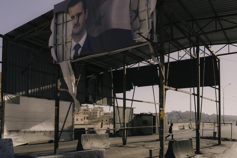 A destroyed Syrian army checkpoint Monday on the road between Damascus and the Lebanese border.