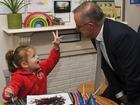 Australian Opposition Leader Anthony Albanese speaks to a child during a visit to a Goodstart Early Learning Childcare Centre on Day 39 of the 2022 federal election campaign in Sydney, Thursday, May 19, 2022. (AAP Image/Lukas Coch) NO ARCHIVING