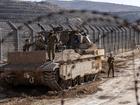 Israeli soldiers on Monday along the border fence with Syria near the Druze village of Majdal Shams in the occupied Golan Heights. 