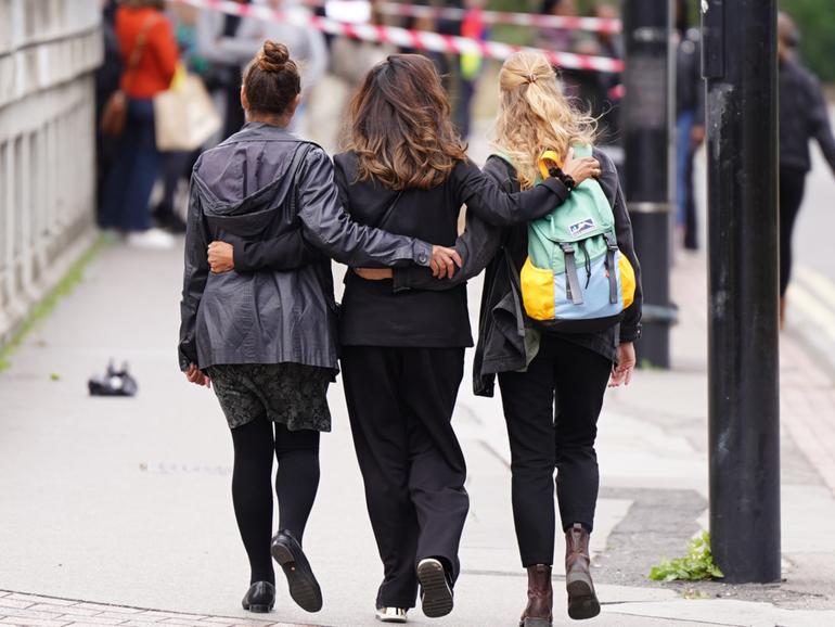 People at the scene where 15-year-old Elianne Andam was stabbed to death.