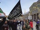 Members of jihadist rebel groups have appeared on the streets of Damascus along with the police. (AP PHOTO)