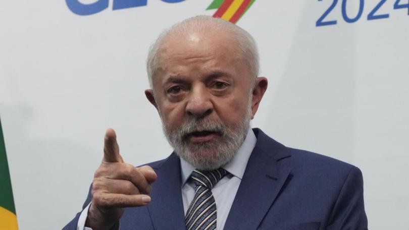 Brazilian President Luiz Inacio Lula da Silva is "well" after brain surgery, the government says. (AP PHOTO)