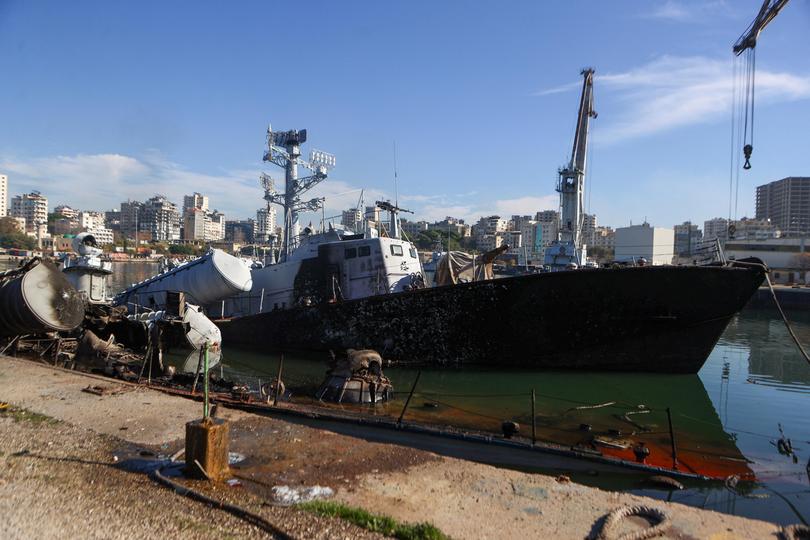 A Syrian naval ship, destroyed in an overnight Israeli attack, is pictured in the port city of Latakia on December 10, 2024. - The UN special envoy for Syria on December 10 called on Israel to halt its military movements and bombardments inside Syria, days after the fall of president Bashar al-Assad. (Photo by AAREF WATAD / AFP) Picture: AAREF WATAD