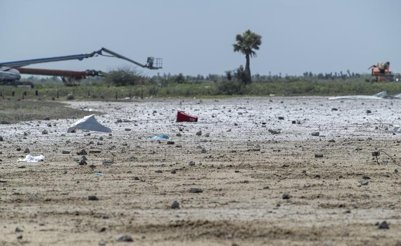 Clean up begins following the launch of the Space Starship spacecraft and Super Heavy rocket launched from Starbase that heavily damaged the pad on April 20, 2023. MUST CREDIT: Jonathan Newton/The Washington Post