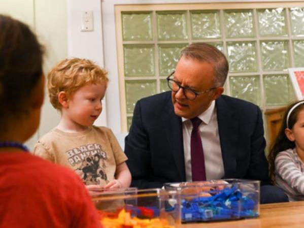 Anthony Albanese says every child will be able to attend childcare for at least three days a week.