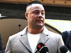 A Jarryd Hayne supporter who spat at the footballer’s rape accuser has been ordered to pay legal costs after alleging he had been defamed.