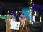 Saudi minister Abdulaziz bin Turki al-Faisal al-Saud (L) and football president Yasser Al Misehal.