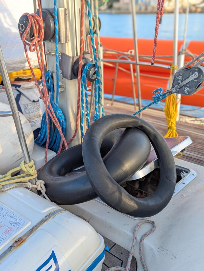 The girl survived by clinging to a makeshift raft made of tires and a life-jacket.