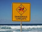 Warning signs were on a beach where four people were caught in a rip and drowned. 