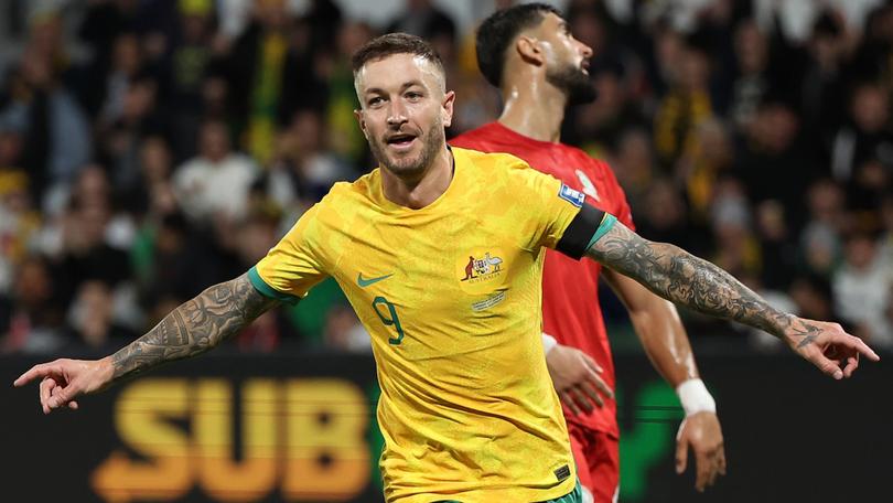 Adam Taggart and the Socceroos will play a crucial fixture in Perth next June.