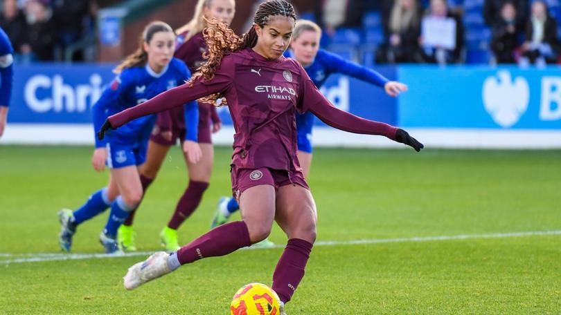 Mary Fowler of Manchester City Women scores against Everton.