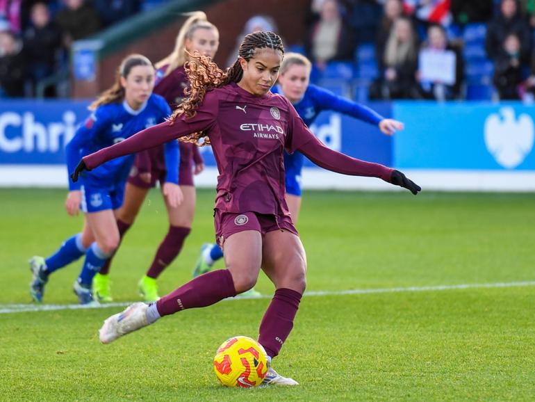 Mary Fowler of Manchester City Women scores against Everton.