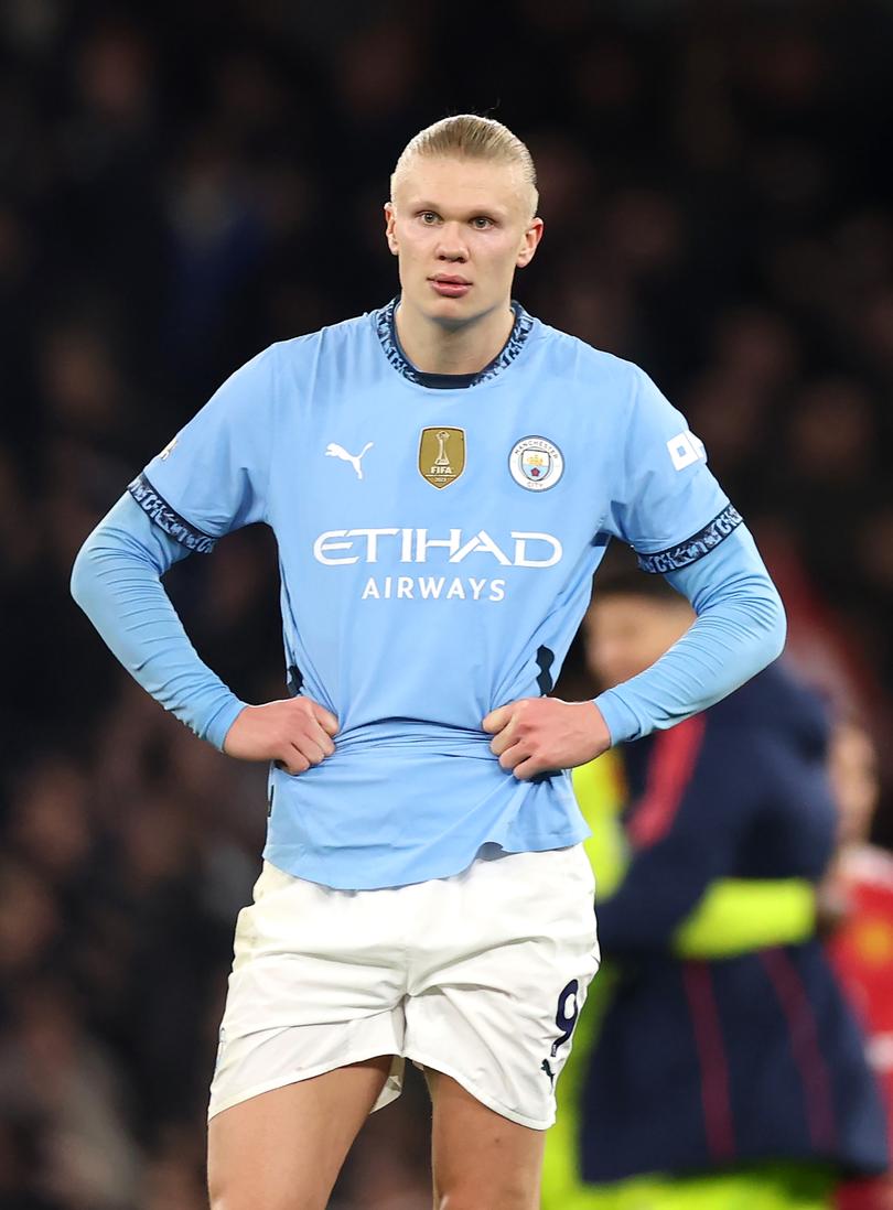 Erling Haaland ooks dejected after the team's defeat to Manchester City FC.