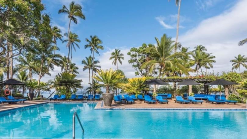 Seven guests of the Warwick Resort on Fiji's Coral Coast, including at least four Australians, were hospitalised in an alleged mass poisoning incident after they fell ill after drinking from the resort bar on Saturday night.