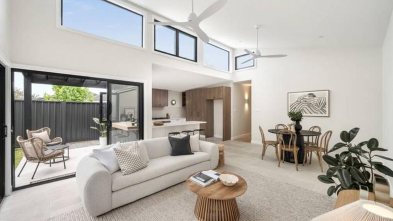 The living room has high ceilings.