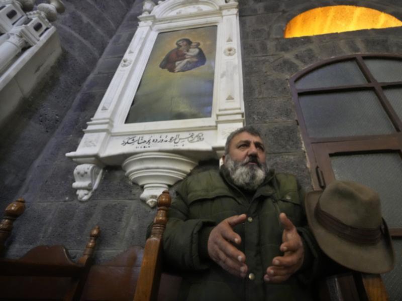 Many Christian worshippers in the Syrian capital Damascus are cautious about the new rulers. 