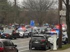 Emergency vehicles are parked outside the Abundant Life Christian School in Wisconsin.