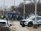 Emergency vehicles are parked outside of the SSM Health clinic where parents are being reunified with children after a shooting at the Abundant Life Christian School in Madison, Wis., Monday, Dec. 16, 2024. (AP Photo/Scott Bauer)