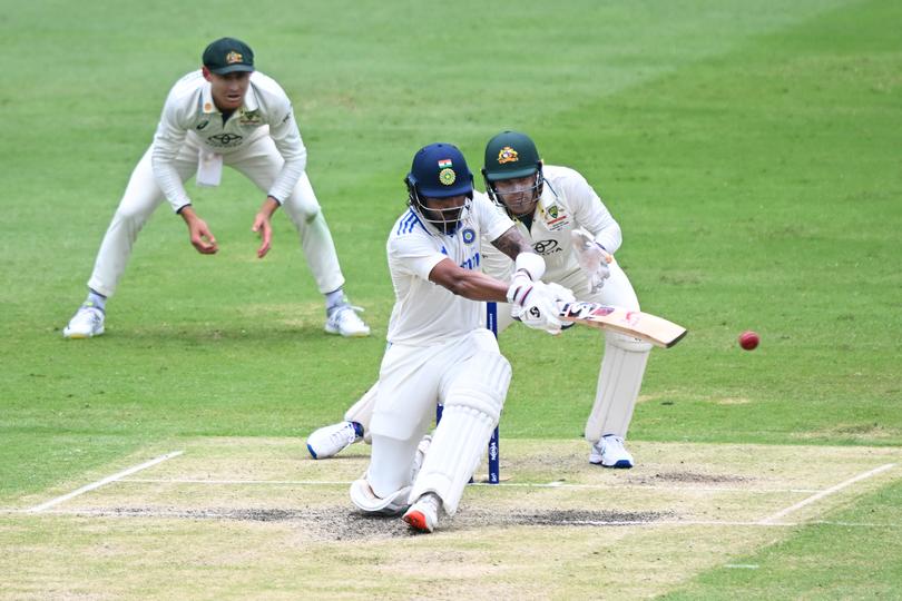 KL Rahul sweeps against Nathan Lyon.