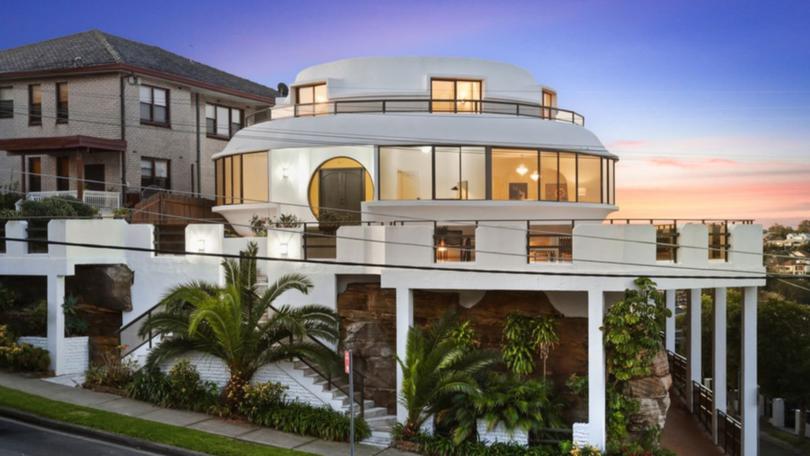 Space age vibes got you clicking on this UFO inspired house in Earlwood, NSW.