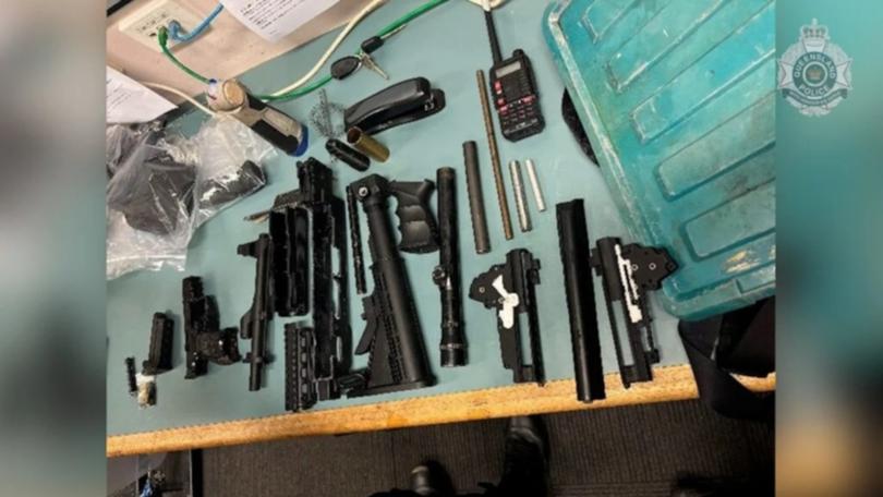 Police took possession of multiple firearms during the search and seizure.