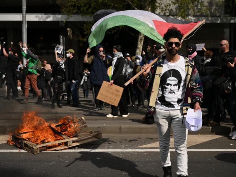 The crackdown includes a ban on flags of listed terrorist organisations. (Joel Carrett/AAP PHOTOS)