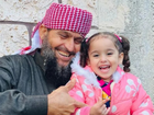 Khaled Nabhan with his granddaughter Reem, who was killed in November 2023 in what he said at the time was an Israeli airstrike in Al Nuseirat refugee camp in southern Gaza.