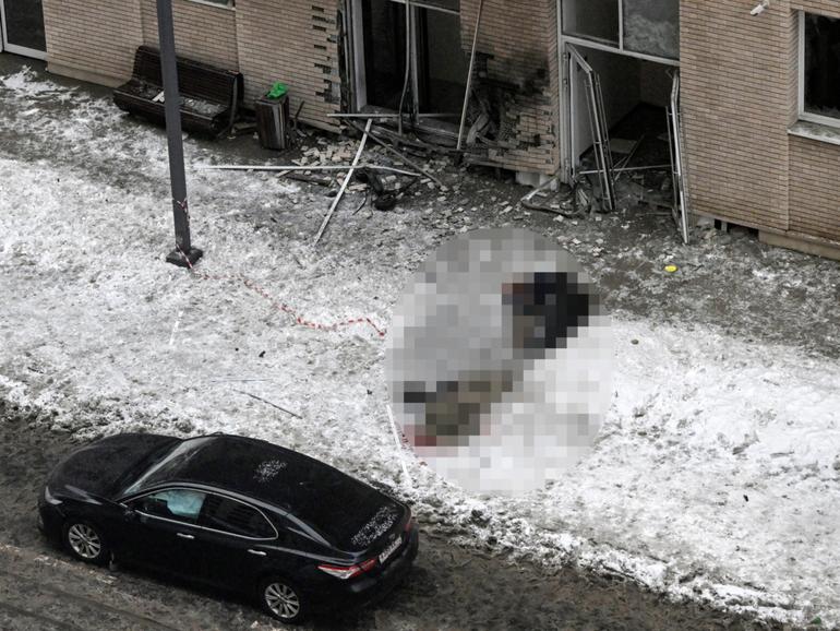 Bodies of the commander of Russian armed forces' chemical, biological and radiation defence troops, Igor Kirillov, (top) and his assistant are seen at the blast scene.