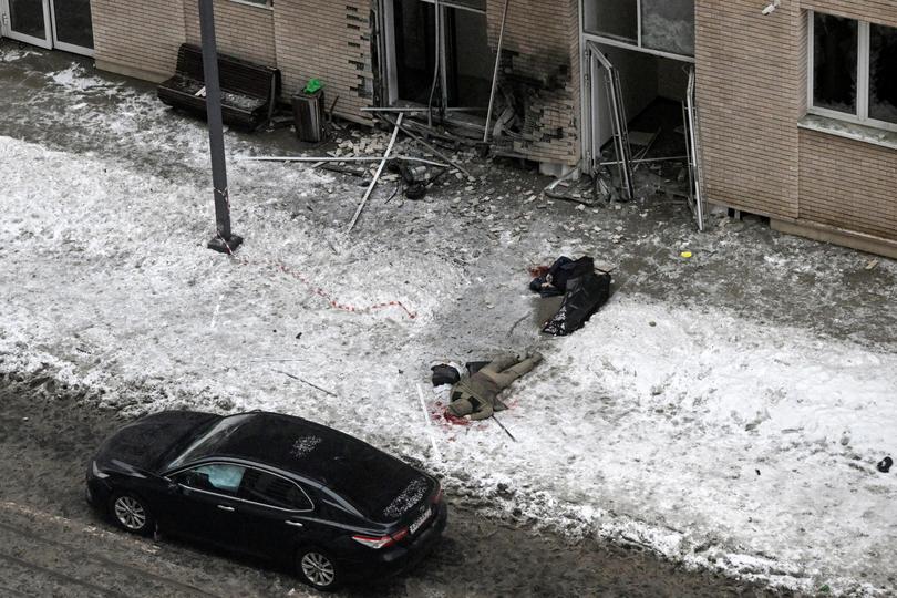 Bodies of the commander of Russian armed forces' chemical, biological and radiation defence troops, Igor Kirillov, (top) and his assistant are seen at the blast scene.