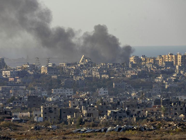 Smoke rises following an explosion in the Gaza Strip as seen from southern Israel, Wednesday, Dec.18, 2024. 