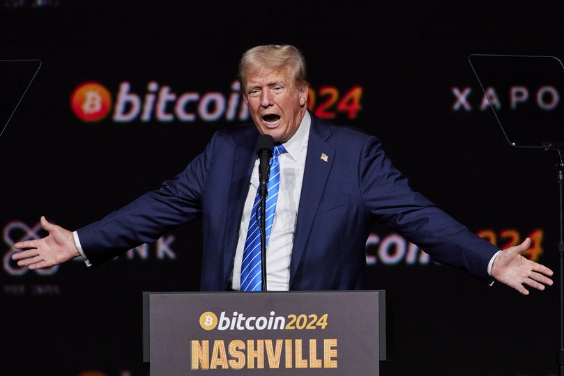 Donald Trump reacts at the Bitcoin Conference in Nashville in July. After winning the presidency again, Trump is moving to make the federal government more friendly to cryptocurrency. 