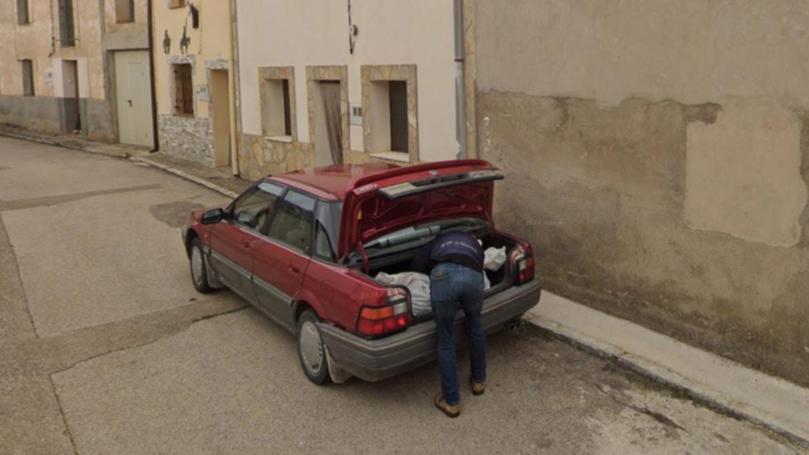 Screenshots from Google street view that Spanish police used to uncover the disappearance of a man in his thirties. A man was arrested on Wednesday after he was spotted on street view loading a large white bag into the boot of his car. 