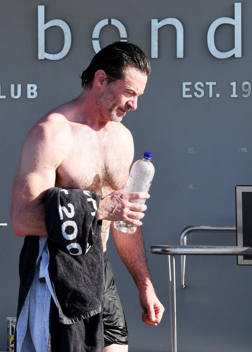 Hugh Jackman appears shirtless after a workout in Sydney.