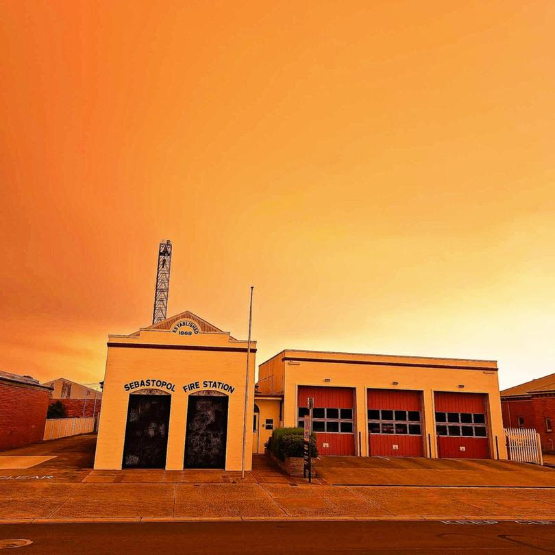 Heavy smoke from the fire has blown into the town of Sebastopol in Ballarat, creating an orange sky.