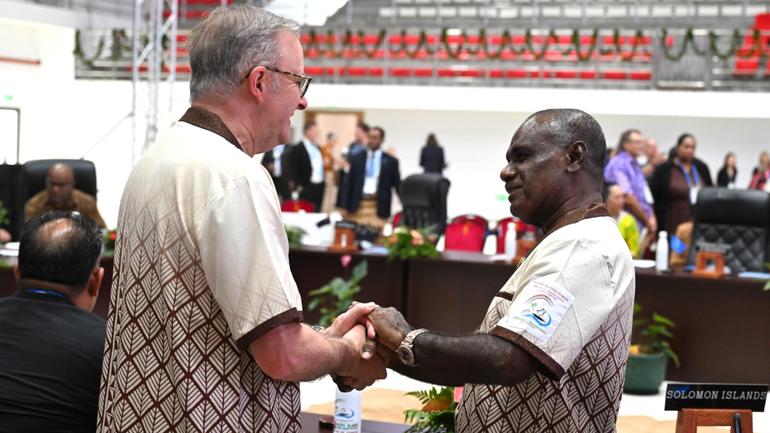 Prime Minister Anthony Albanese greets the Prime Minister of Solomon Islands Jeremiah Manele at the start of the plenary session at the 53rd Pacific Islands Forum Leaders Meeting in August.