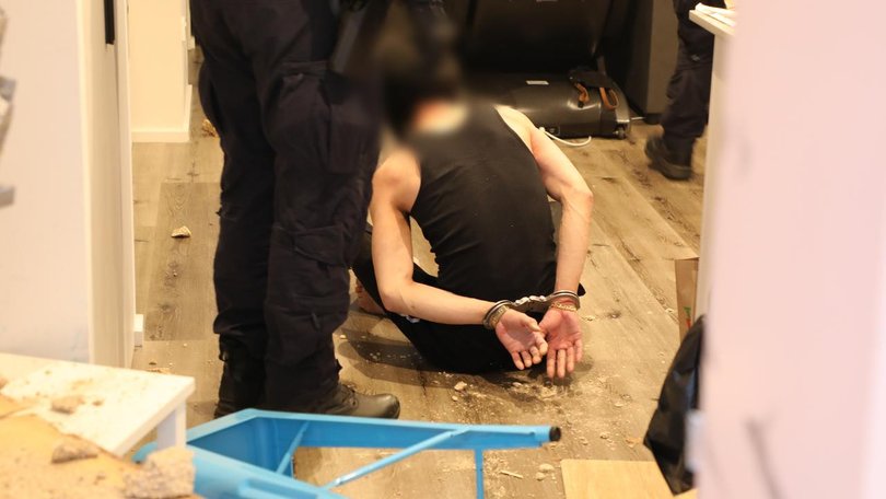 Heavily armed police smashed their way into a Liverpool unit and arrested a 37-year-old man.