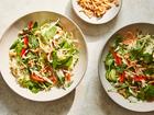 Chicken and herb salad with nuoc cham. Food Stylist: Monica Pierini. Nuoc cham, a Vietnamese sauce bright with lime juice and chile, gives the dish its salty-sweet finish, while thinly sliced bell pepper and shaved cabbage provide crunch. (Linda Xiao/The New York Times)