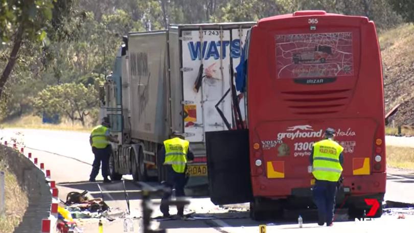 The Greyhound bus was travelling up an incline on the Hume Hwy when it is believed to have smashed into the back of a truck in the northbound lanes on Saturday.