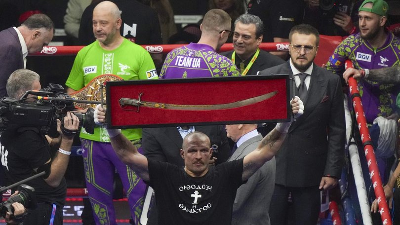 Oleksandr Usyk celebrates retaining his heavyweight world titles against Tyson Fury in Riyadh.