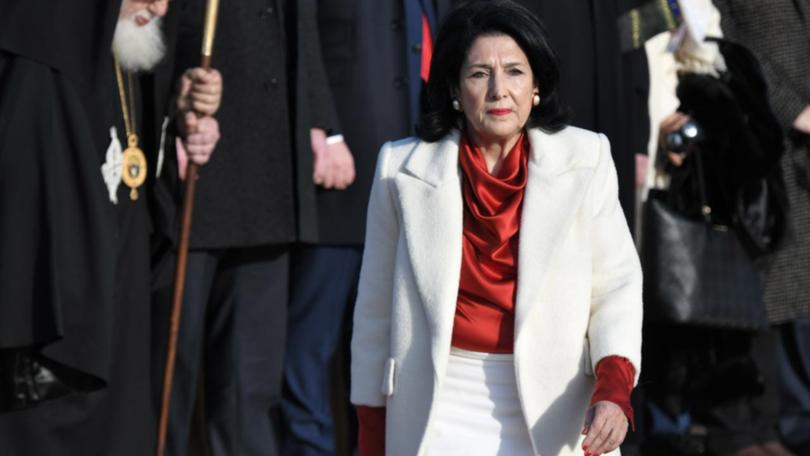 President Salome Zurabishvili's term expires in less than a week and she is facing jail threats.