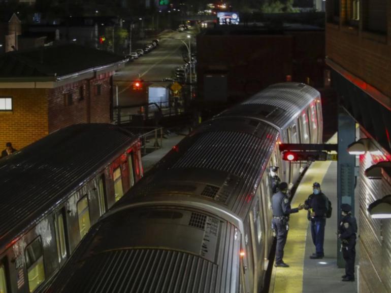 A woman has burned to death after being set on fire while sleeping on a New York subway car.