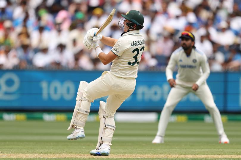 MELBOURNE, AUSTRALIA - DECEMBER 26: Marnus Labuschagne of Australia plays a shot during day one of the Men's Fourth Test Match in the series between Australia and India at Melbourne Cricket Ground on December 26, 2024 in Melbourne, Australia. (Photo by Robert Cianflone/Getty Images)